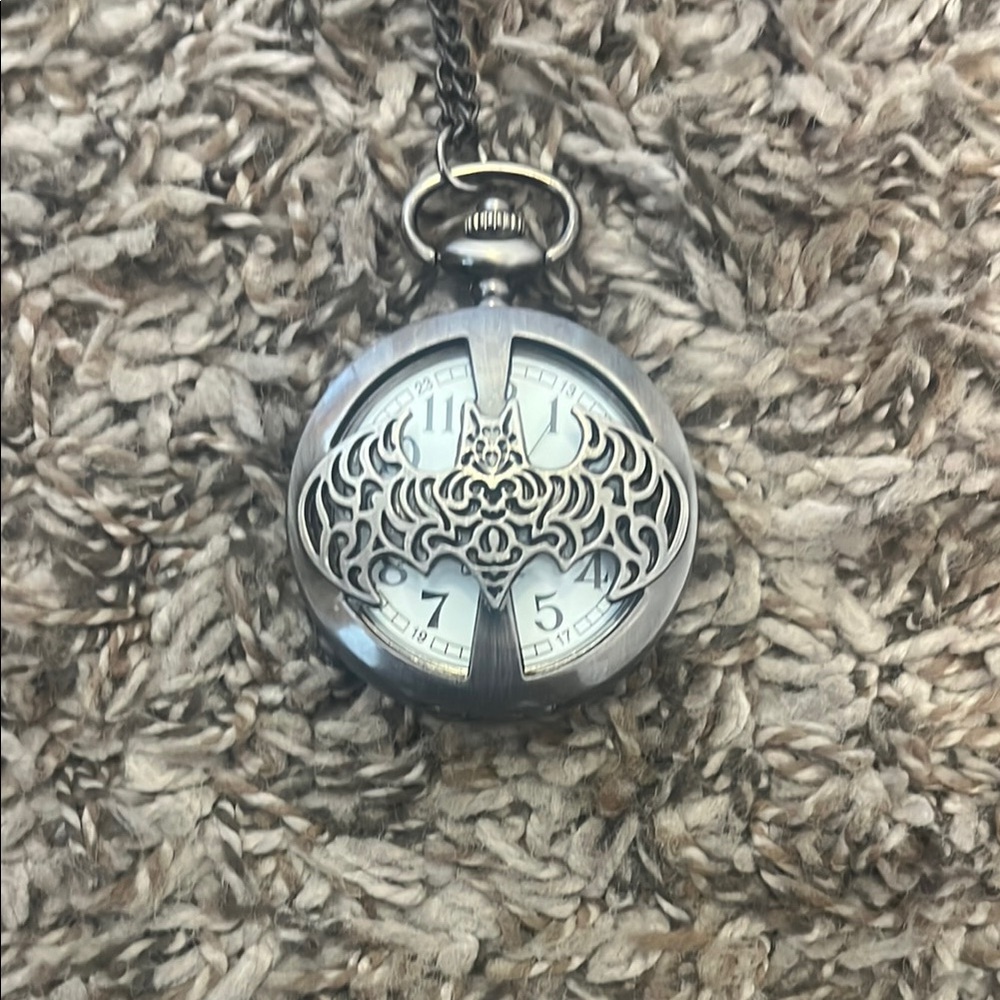 Vintage Silver Pocket Watch with Bat Motif